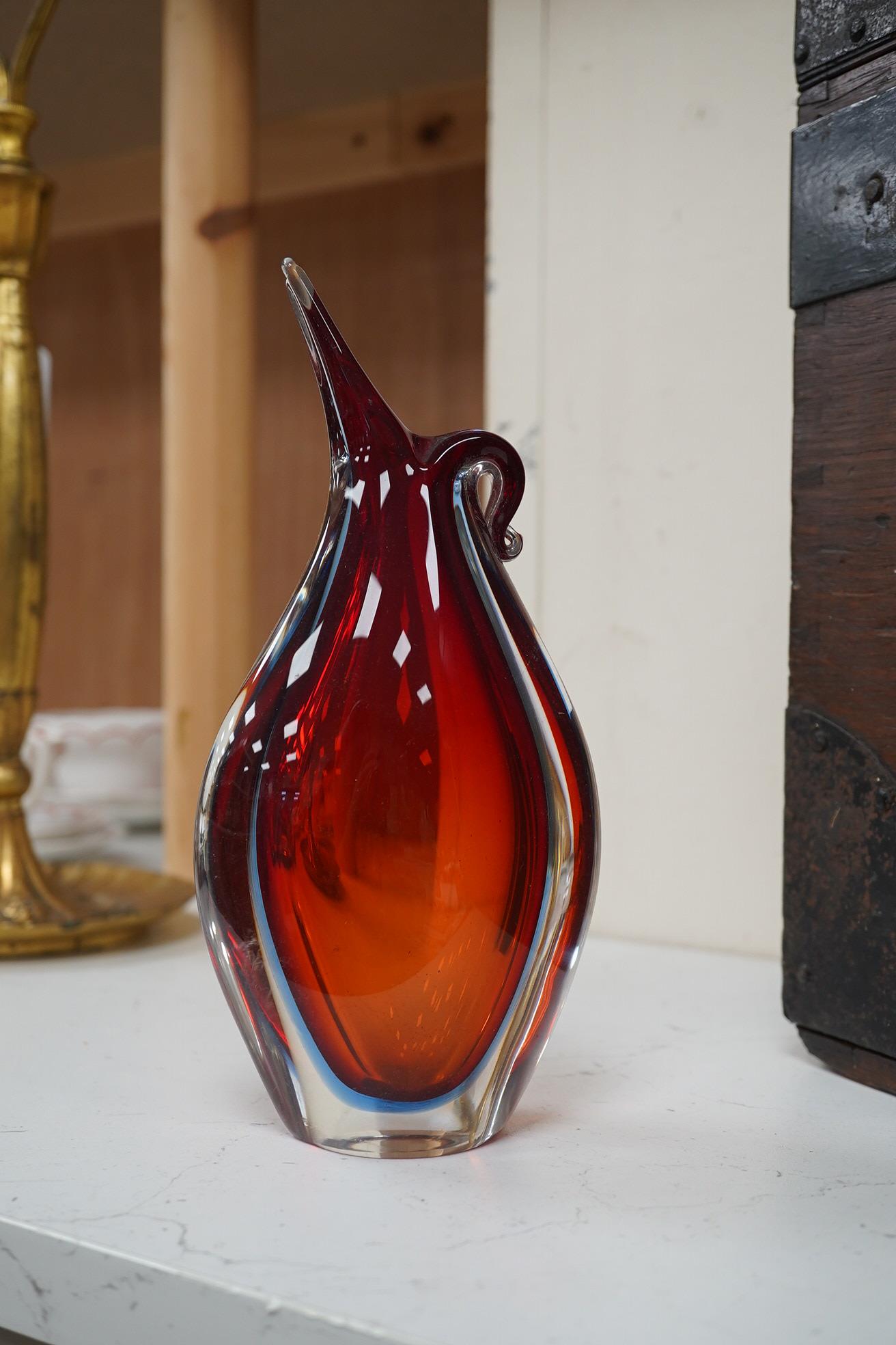 Seven red glass vases including Whitefriars, tallest 21cm high. Condition - good